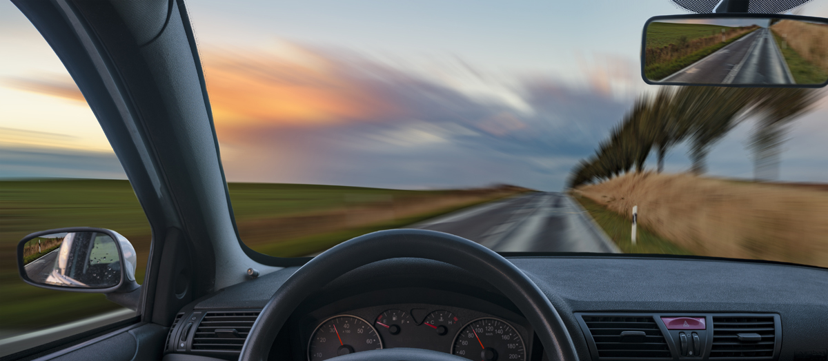 A,View,From,Behind,The,Steering,Wheel,Of,A,Car